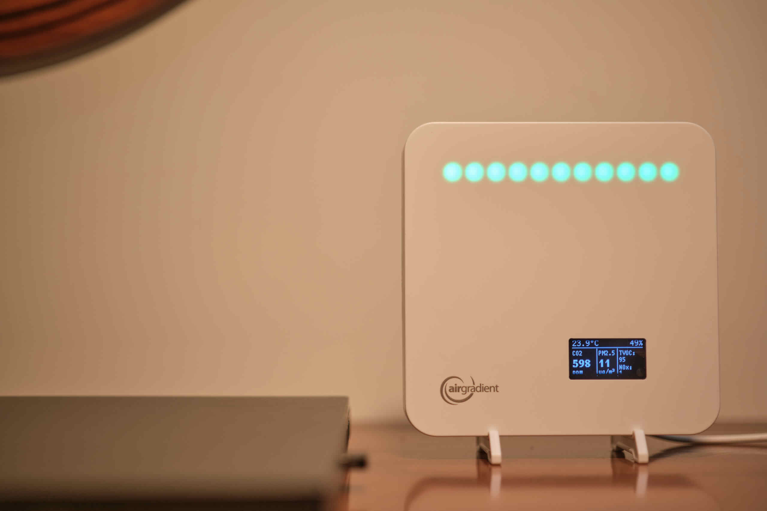 Airgradient One Review - An Open-Source, Affordable Air Quality Monitor 11 Airgradient ONE AQM on Desk